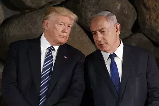 President Donald Trump, left, talks with Israeli Prime Minister Benjamin Netanyahu during a ceremony, May 23, 2017, in Jerusalem. Former President Donald Trump offered a tough message to Israel over its war against Hamas on Thursday, April 4, 2024, urging the country to "Get it over with." In an interview with conservative radio host Hugh Hewitt, Trump said that Israel is "absolutely losing the PR war," and called for a swift resolution to the bloodshed. (AP Photo/Evan Vucci, File)