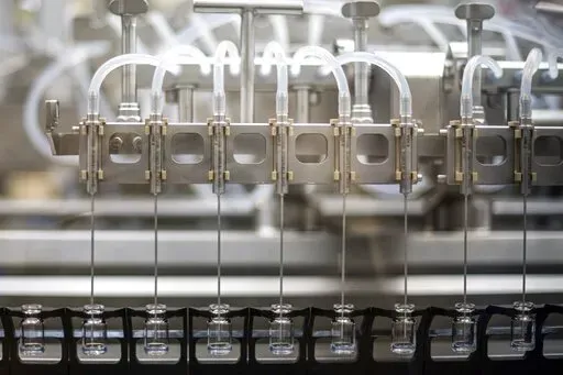 This May 2022 photo provided by Pfizer shows production of the Pfizer's COVID-19 vaccine for children under 5 in Puurs, Belgium.   U.S. health advisers on Saturday, June 18,  recommended COVID-19 vaccines for infants, toddlers and preschoolers — the last group without the shots. (Pfizer via AP)