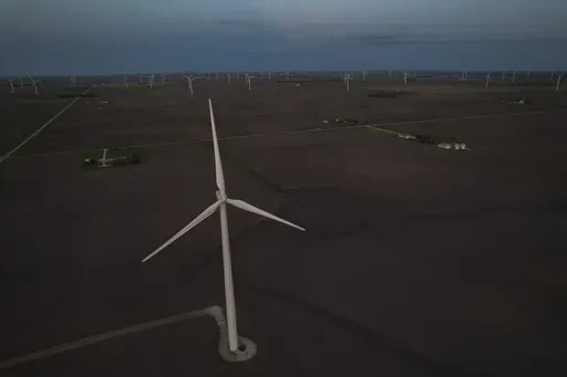 Wind turbines operate May 7, 2024, in Paxton, Ill. (AP Photo/Joshua A. Bickel, File)
