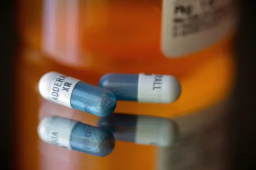 Adderall XR capsules are displayed on Feb. 24, 2023. Prescriptions for ADHD treatments surged among adults during the COVID-19 pandemic, helping to fuel lingering shortages that are frustrating parents and doctors. A study published Wednesday, Jan. 10, 2024 in JAMA Psychiatry says new prescriptions for stimulants used to treat the condition jumped 30% for young adults and women during a two-year window after the pandemic hit in March 2020. (AP Photo/Jenny Kane)