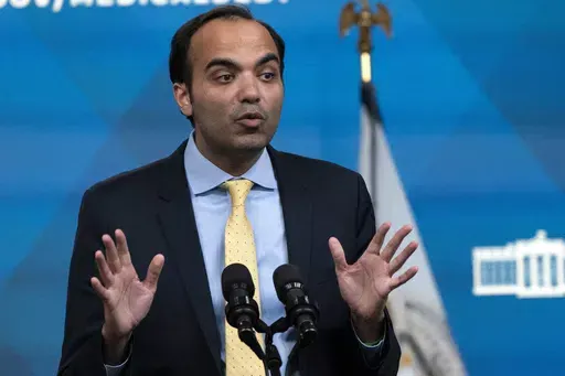 Consumer Financial Protection Bureau Director Rohit Chopra speaks from the South Court Auditorium on the White House complex in Washington, April 11, 2022. The Consumer Financial Protection Bureau says in a new rule that buy now, pay later lenders are basically credit card providers and must provide the same protections and rights that apply to those lenders. (AP Photo/Jacquelyn Martin, File)