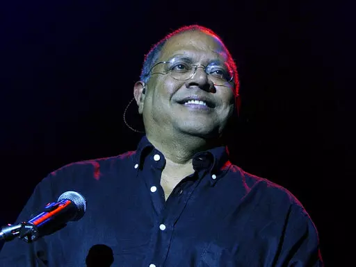 Cuban singer Pablo Milanes performs during a concert in Buenos Aires, Argentina, Wednesday Oct. 6, 2004. Milanés, the Latin Grammy-winning balladeer who helped found Cuba’s “nueva trova” movement and toured the world as a cultural ambassador for Fidel Castro’s revolution, died early Tuesday, Nov. 22, 2022, in Spain, where he had been under treatment for blood cancer. He was 79. (AP Photo/Natacha Pisarenko, File)