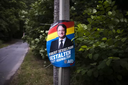 A election campaign poster of far-right AfD candidate Robert Sesselmann remains at a street at the outskirts of the small city Sonneberg at the German federal state Thuringia, Wednesday, July 5, 2023. The Alternative for Germany, or AfD, candidate Robert Sesselmann won the runoff election for a local county administrator in Sonneberg county on June 25, 2023. Sonneberg has a relatively small population of 56,800, but the win is a symbolic milestone for the far-right populist party AfD.(AP Photo/M