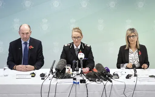 Professor Tim Atkins, Merseyside Police Chief Constable Serena Kennedy, and Dr Renu Bindra meet the press at Merseyside Police Headquarters, Liverpool, England, Tuesday, Oct. 29, 2024. Axel Rudakubana, 18, the teenager accused in a stabbing rampage that killed three girls at a Taylor Swift-themed dance class in England has been charged with producing the deadly poison ricin and faces a terror offense. (Danny Lawson/PA via AP)