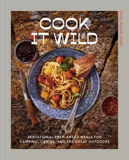 This image released by Clarkson Potter shows "Cook It Wild: Sensational Prep-Ahead Meals for Camping, Cabins, and the Great Outdoors:" by Chris Nuttall-Smith. (Clarkson Potter via AP)