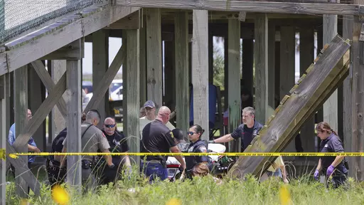 An elevated walkway collapsed an injured several members of a visiting youth group at Stahlman Park in Surfside Beach, Texas, Thursday, Jun. 8, 2023. Nearly two dozen teenagers from a summer camp were injured when an elevated walkway collapsed Thursday in the beachside city in Texas, with five flown to the hospital by helicopter. (Mike Felix/The Brazosport Facts via AP)