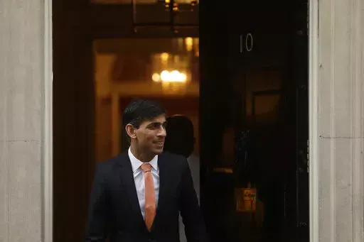 FILE -British newly appointed Chancellor of the Exchequer Rishi Sunak leaves 10 Downing Street, where he was given the job by Britain's Prime Minister Boris Johnson, in London, Thursday, Feb. 13, 2020. Sunak ran for Britain’s top job and lost. Now he’s back with a second chance to become prime minister. (AP Photo/Matt Dunham, File)