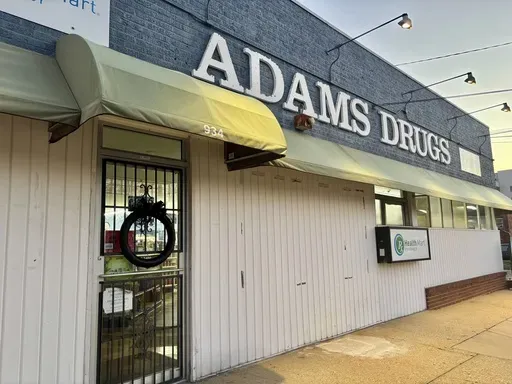 A black wreath hangs on the door of Adams Drugs in Montgomery, Ala., Feb. 25, 2025. (AP Photo/Kim Chandler)