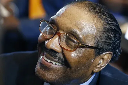 Former Democratic speaker Pro-Tem Robert Clark smiles as he in congratulated by well wishers for overcoming barriers 50 years ago to become Mississippi's first black legislator since Reconstruction at the Old Capitol Museum in Jackson, Miss. Aug. 9, 2017. (AP Photo/Rogelio V. Solis, File)