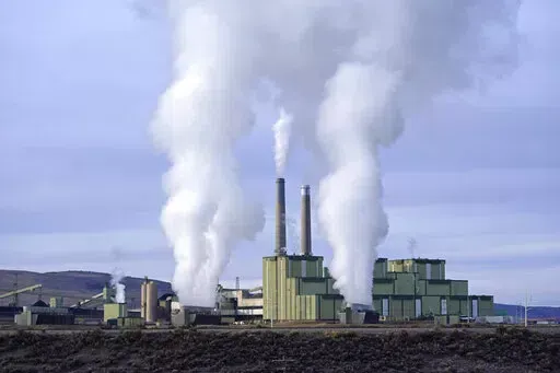 Steam billows from a coal-fired power plant Nov. 18, 2021, in Craig, Colo. The Supreme Court on Thursday, June 30, 2022, limited how the nation’s main anti-air pollution law can be used to reduce carbon dioxide emissions from power plants. By a 6-3 vote, with conservatives in the majority, the court said that the Clean Air Act does not give the Environmental Protection Agency broad authority to regulate greenhouse gas emissions from power plants that contribute to global warming. (AP Photo/Ric