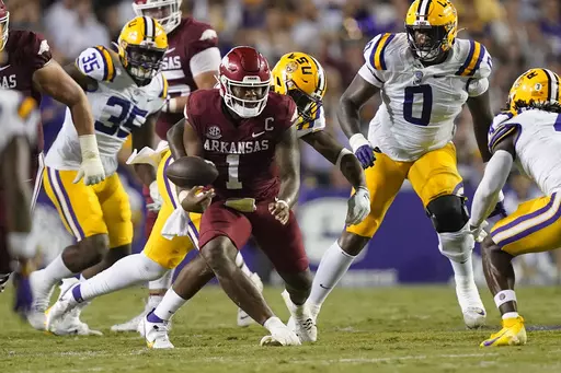 Arkansas quarterback KJ Jefferson (1) fumbles in the second half of an NCAA college football game against LSU in Baton Rouge, La., Saturday, Sept. 23, 2023. LSU won 34-31. (AP Photo/Gerald Herbert)