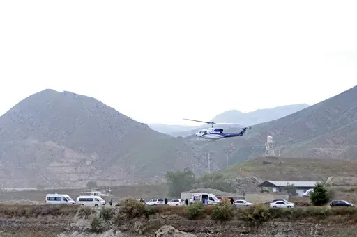 The helicopter carrying Iranian President Ebrahim Raisi takes off at the Iranian border with Azerbaijan after President Raisi and his Azeri counterpart Ilham Aliyev inaugurated dam of Qiz Qalasi, or Castel of Girl in Azeri, Iran, on May 19, 2024. While the cause of the May 19 crash remains unknown, the sudden death of the hard-line protégé of Iranian Supreme Leader Ayatollah Ali Khamenei exposed the contradictions and challenges facing the country's Shiite theocracy. (Ali Hamed Haghdoust, IRNA