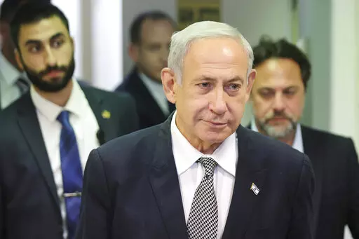 Israeli Prime Minister Benjamin Netanyahu attends a hearing at the Magistrate's Court in Rishon LeZion, Israel, Monday, Jan. 23, 2023. Netanyahu has made a surprise trip to Jordan to meet with King Abdullah II. Tuesday, Jan 24. (Abir Sultan/Pool Photo via AP)