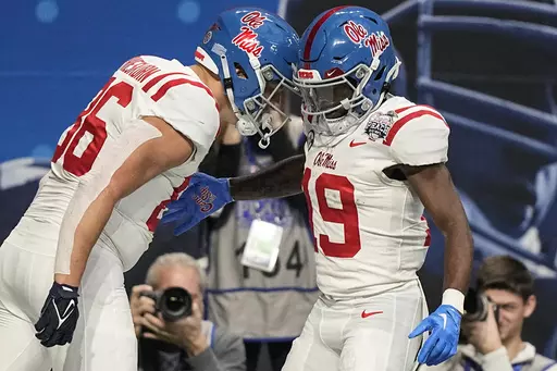 Mississippi tight end Caden Prieskorn (86) celebrates his touchdown against Penn State during the first half of the Peach Bowl NCAA college football game, Saturday, Dec. 30, 2023, in Atlanta. (AP Photo/Brynn Anderson)