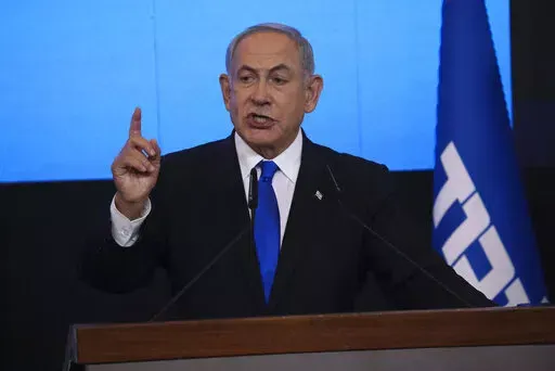 Benjamin Netanyahu, former Israeli Prime Minister and the head of Likud party, speaks to his supporters after first exit poll results for the Israeli Parliamentary election at his party's headquarters in Jerusalem on Nov. 2, 2022. Netanyahu announced late Wednesday, Dec. 21, 2022, that he has successfully formed a new coalition, setting the stage for him to return to power as head of the most right-wing Israeli government ever. (AP Photo/Oren Ziv, File)