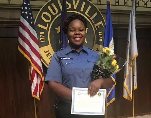 This undated file photo provided by Taylor family attorney Sam Aguiar shows Breonna Taylor in Louisville, Ky. (Courtesy of Taylor Family attorney Sam Aguiar via AP, File)