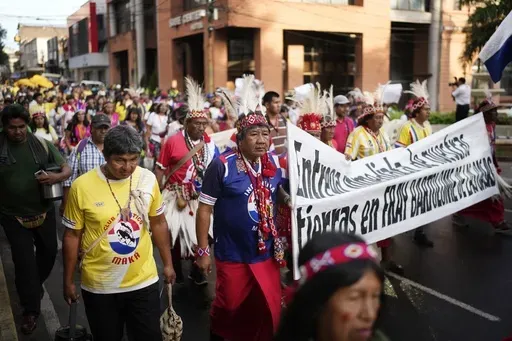 Maka Indigenous people march to protest for the recovery of ancestral lands in Asuncion, Paraguay, Feb. 28, 2024. (AP Photo/Jorge Saenz, File)