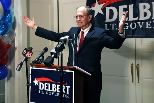 Mississippi Republican Lt. Gov. Delbert Hosemann raises his arms in victory as he addresses supporters in Jackson, Miss., after winning the party primary Tuesday, Aug. 8, 2023. Hosemann defeated two challengers in his reelection bid for the party nomination. (AP Photo/Rogelio V. Solis)