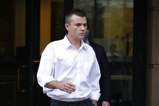 Igor Danchenko leaves the Albert V. Bryan United States Courthouse in Alexandria, Va., Nov. 4, 2021. Danchenko, a think tank analyst who played a major role in the creation of a flawed report about former President Donald Trump, is scheduled to go on trial Tuesday, Oct. 11, 2022, for lying to the FBI about how he developed information that went into what is now infamously known as the “Steele dossier.” (AP Photo/Manuel Balce Ceneta, File)