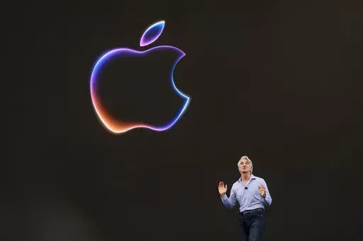 Craig Federighi, Apple's senior vice president of software engineering, speaks during an announcement of new products at the Apple campus in Cupertino, Calif., on Monday, June 10, 2024. (AP Photo/Jeff Chiu)