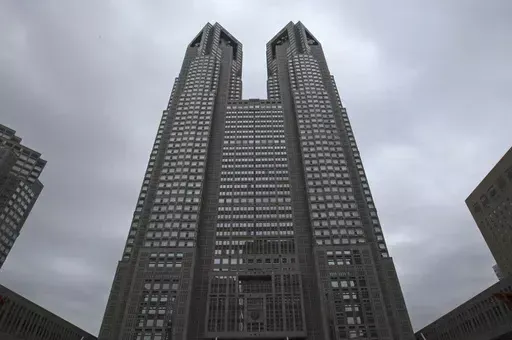 The Tokyo Metropolitan Government Office building soars in Tokyo, on June 15, 2016. Called “Tokyo Futari Story,” the city hall online site is just that: An effort to create couples, “futari,” in a country where it is increasingly common to be “hitori," or alone. (AP Photo/Shuji Kajiyama, File)