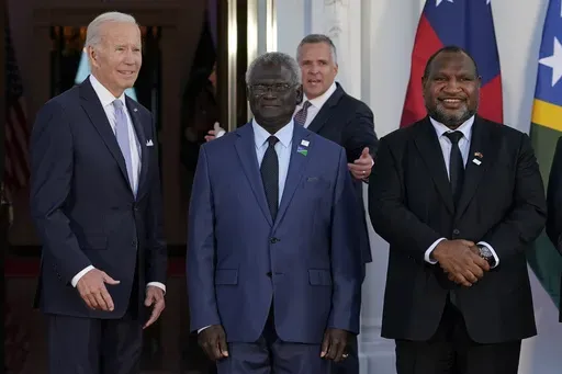 President Joe Biden poses for photos with Pacific Island leaders including Solomon Islands Prime Minister Manasseh Sogavare, center, and Papua New Guinea Prime Minister James Marape on the North Portico of the White House in Washington, Sept. 29, 2022. On Wednesday, May 17, Biden canceled a visit to Papua New Guinea planned for May 22 to focus on debt limit talks at home, disappointing many in the Pacific Island nation. (AP Photo/Susan Walsh, File)