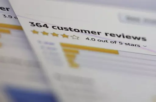 In this April 17, 2019, file photo, online customer reviews for a product are displayed on a computer in New York. Some of the most used platforms for travel and online shopping said Tuesday, Oct. 17. 2023 they’re going to team up to battle fake reviews. Amazon, reviews site Glassdoor and Trustpilot as well as travel companies Expedia Group, Booking.com and Tripadvisor announced they're launching a group called the “Coalition for Trusted Reviews." (AP Photo/Jenny Kane, File)