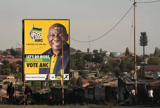 An election poster, with President Cyril Ramaphosa atop a pole in Soweto, South Africa, on April 22, 2024. Ramaphosa has tried to rebuild the reputation of the ANC by cracking down on government graft, but unemployment has risen to 32% under him and he has struggled to curb poverty. (AP Photo/Themba Hadebe, File)