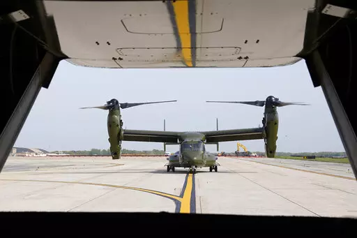 A U.S. Marine Corps Osprey aircraft taxies behind an Osprey carrying members of the White House press corps at Andrews Air Force Base, Md., on April 24, 2021. Norwegian authorities are searching for a U.S. Marine Corps aircraft that went missing during a training exercise. Norway's military says the Marine Osprey was reported missing Friday night. March 18, 2022, when it did not make a scheduled arrival at the Arctic Circle municipality Bodø. (AP Photo/Patrick Semansky)
