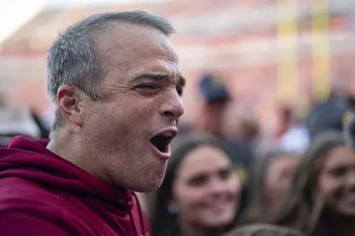 South Carolina head coach Shane Beamer celebrates after defeating Clemson in an NCAA college football game Saturday, Nov. 30, 2024, in Clemson, S.C. (AP Photo/Jacob Kupferman)