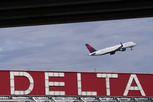 A Delta Air Lines plane takes off from Hartsfield-Jackson Atlanta International Airport in Atlanta, Nov. 22, 2022. A consumer class action lawsuit filed Tuesday, May 30, 2023, claims Delta Air Lines inaccurately billed itself as the world's “first carbon-neutral airline” and should pay damages. The complaint in California federal court alleges the airline relied on carbon offsets that were largely bogus. (AP Photo/Brynn Anderson, File)