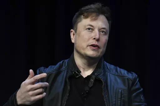 Tesla and SpaceX CEO Elon Musk speaks at the SATELLITE Conference and Exhibition, March 9, 2020, in Washington. Musk on Tuesday, May 16, 2023, dismissed speculation that he might step down as Tesla's CEO and told the company’s annual shareholders meeting that the the electric car and solar panel company would start doing a small amount of advertising. (AP Photo/Susan Walsh, File)