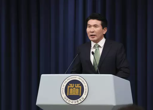 South Korea's presidential office's senior secretary for civil and social affairs Hwang Sang Moo briefs at the presidential office in Seoul, South Korea, Monday, Jan. 22, 2024. South Korea’s presidential office said Monday it approved a request by the country’s Truth and Reconciliation Commission to extend its term by a year through late-May 2025. Investigators had been calling for more time to examine a broad range of human rights violations linked to Seoul’s past military governments, in