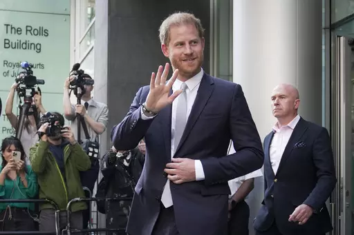 Prince Harry leaves the High Court after giving evidence in London, Wednesday, June 7, 2023. A London judge has allowed Prince Harry's lawsuit against the publisher of The Sun tabloid to go to trial on claims the newspaper used unlawful methods to gather information about him. (AP Photo/Kin Cheung, File)