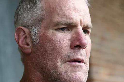 Former NFL quarterback Brett Favre speaks to the media in Jackson, Miss., Oct. 17, 2018. Favre is asking the Mississippi Supreme Court to remove him as a defendant in a civil lawsuit that seeks to recover millions of dollars of misspent welfare money that was supposed to help some of the neediest people in the United States. In papers filed late Monday, May, 15, 2023, Favre's attorneys argue the Mississippi Department of Human Services is making “utterly meritless” legal arguments in suing F