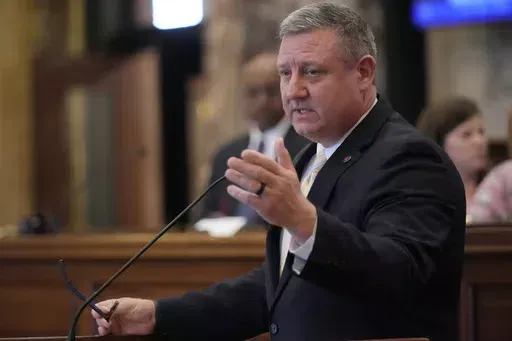 Mississippi State Education Committee Chairman Sen. Dennis DeBar, R-Leakesville, explains his opposition to a revised education bill in the Senate chamber, Tuesday, April 9, 2024, at the Mississippi Capitol in Jackson, Miss. (AP Photo/Rogelio V. Solis)