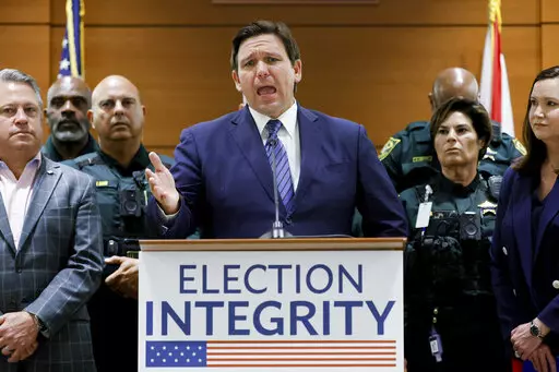 Florida Gov. Ron DeSantis speaks during a news conference at the Broward County Courthouse in Fort Lauderdale, Fla., Aug. 18, 2022. Florida, Georgia, Texas and Virginia all started new law enforcement units to investigate voter fraud in this year’s elections based on former President Donald Trump’s lies about the 2020 presidential contest. So far, those units seem to have produced more headlines than actual cases.  (Amy Beth Bennett/South Florida Sun-Sentinel via AP, File)