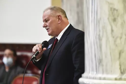 State Rep. Barry Usher, R-Billings, speaks during a meeting of the Joint Rules Committee on the House floor at the Montana State Capitol in Helena, Mont., on Dec. 7, 2020. The dozens of statehouse bills to restrict health care for transgender youths were in many cases not born of grassroots despair and a groundswell of constituent demand, but were pre-written and shopped out by a handful of conservative interest groups. One of the clearest examples is in Montana, where nearly all the language in