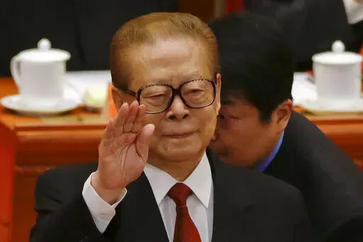 Former Chinese President Jiang Zemin gestures during the opening session of the 18th Communist Party Congress held at the Great Hall of the People in Beijing, China, Thursday, Nov. 8, 2012. Jiang has died Wednesday, Nov. 30, 2022, at age 96. (AP Photo/Ng Han Guan, File)