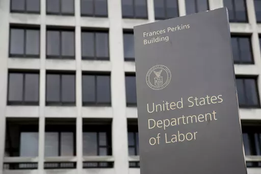 A sign stands outside the U.S. Department of Labor's headquarters, May 6, 2020, in Washington. The U.S. Department of Labor’s Occupational Safety and Health Administration found numerous safety violations in its investigation of the July 2023 workplace accident that caused the death of Duvan Pérez, a Guatemalan teenager who had been a contract worker at the Mar-Jac Poultry plant in Hattiesburg, Miss., the agency said in a news release on Tuesday, Jan. 16, 2024. (AP Photo/Patrick Semansky, Fil