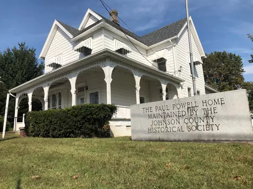 A sign marks he Paul Powell Home and Museum, Oct. 8, 2020 photo in Vienna, Ill. For more than half a century, a Powell-established $250,000 trust sustained his legacy, for better or worse. But the account that maintained his birthplace as a museum will soon run dry. (AP Photo/John O'Connor, File)