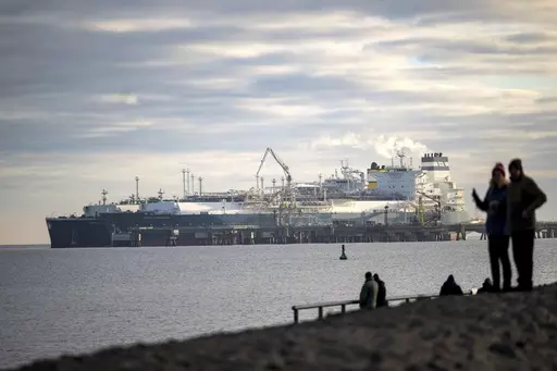 The tanker Maria Energy, left, loaded with liquefied natural gas, is moored at the floating terminal Hoegh Esperanza, in Wilhelmshaven, Germany, Jan. 3, 2023. Attacks by Yemen's Houthi rebels are posing a new threat to the future of energy supplies to the European Union, which relies on imported oil and natural gas to power factories, generate electricity, run vehicles and more. (Sina Schuldt/dpa via AP, file)