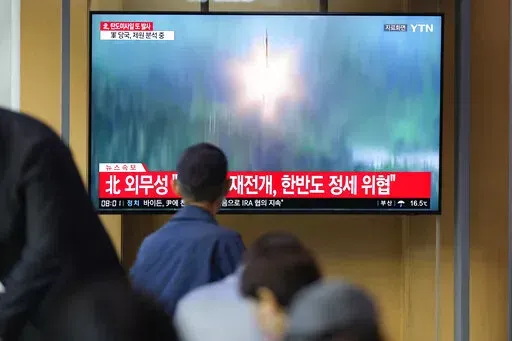A TV screen showing a news program reporting about North Korea's missile launch with file footage, is seen at the Seoul Railway Station in Seoul, South Korea on Oct. 6, 2022. The nuclear-powered aircraft carrier USS Ronald Reagan launched a new round of naval drills with South Korean warships on Friday, a day after North Korea fired more ballistic missiles and flew warplanes in an escalation of its weapons tests. (AP Photo/Lee Jin-man, File)