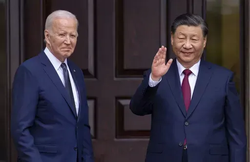 President Joe Biden, left, greets China's President President Xi Jinping in Woodside, Calif., Nov, 15, 2023. The United States sees Hong Kong's new national security law as a tool to potentially silence dissent both at home and abroad, but has tread carefully so far in responding, a disappointment to those fighting for democracy and freedoms in the Chinese territory. (Doug Mills/The New York Times via AP, Pool, File)