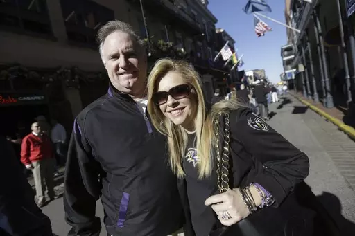 Sean and Leigh Anne Tuohy stand on a street in New Orleans, Feb. 1, 2013. Michael Oher, the former NFL tackle known for the movie “The Blind Side,” filed a petition Monday, Aug. 14, 2023, in a Tennessee probate court accusing Sean and Leigh Anne Tuohy of lying to him by having him sign papers making them his conservators rather than his adoptive parents nearly two decades ago. (AP Photo/Gerald Herbert, File)