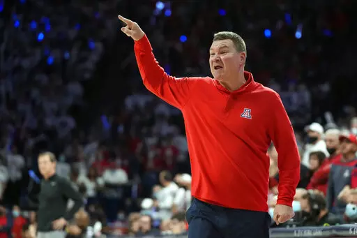 Arizona coach Tommy Lloyd reacts to a play during the second half of the team's NCAA college basketball game against Oregon, Saturday, Feb. 19, 2022, in Tucson, Ariz. Arizona won 84-81. (AP Photo/Rick Scuteri)