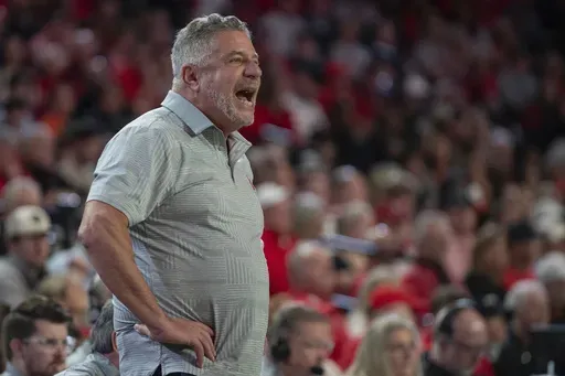 Auburn head coach Bruce Pearl yells to his team during the first half of an NCAA college basketball game against Georgia, Saturday, Jan. 18, 2025, in Athens, Ga. (AP Photo/Kathryn Skeean)