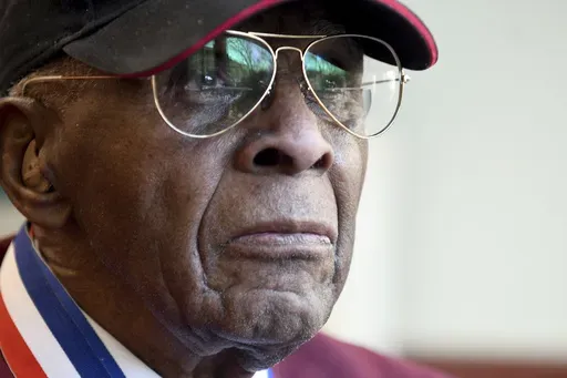 101-year-old Col. James H. Harvey III, one of the last surviving Tuskegee Airmen, sits for a portrait in Aurora, Colo., Wednesday, March 12, 2025. (AP Photo/Thomas Peipert)