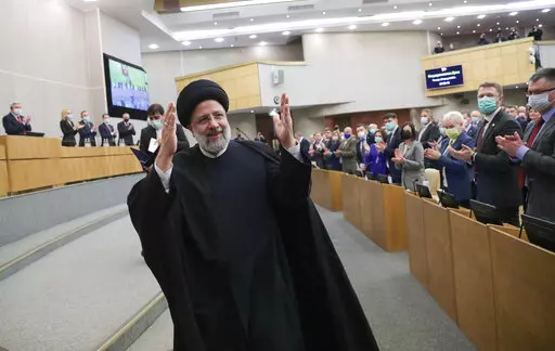 In this handout photo released by The State Duma, The Federal Assembly of The Russian Federation Press Service, Iranian President Ebrahim Raisi gestures after delivering his speech at the State Duma, the Lower House of the Russian Parliament in Moscow, Russia, Jan. 20, 2022. Russia’s war on Ukraine has exposed just how much Iran has tilted toward Moscow in recent years. Among ordinary Iranians, there is a great deal of sympathy for Ukraine. (The State Duma, The Federal Assembly of The Russian 