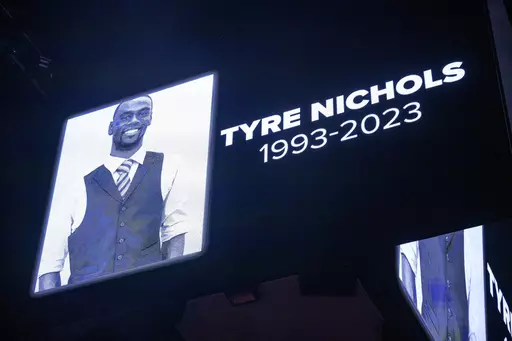 The screen at the Smoothie King Center in New Orleans honors Tyre Nichols before an NBA basketball game between the New Orleans Pelicans and the Washington Wizards, Jan. 28, 2023. Desmond Mills Jr., a former Memphis police officer, is changing his plea from not guilty on federal charges that he violated Nichols' civil rights by fatally beating him after a traffic stop in January 2023. A change of plea hearing has been scheduled for Thursday, Nov. 2, for Mills Jr., according to court documents an